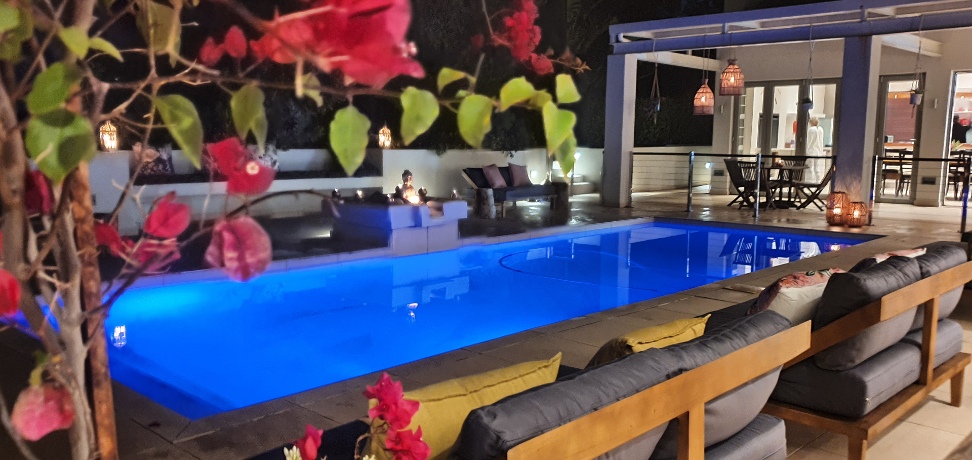 The pool at a Hillhouse residence, framed by bougainvillea