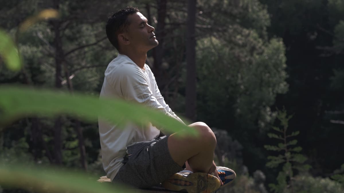 Person struggling with addiction at home